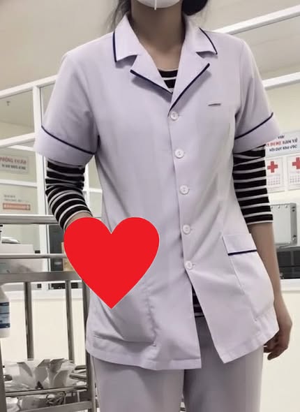 Cô y tá , vợ anh nào vậy